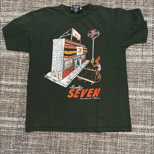 Overtime 7/11 collaboration- Lucky Seven Kids' Green Graphic Tee